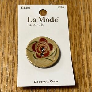 Flower painted on coconut button $1 if bundled